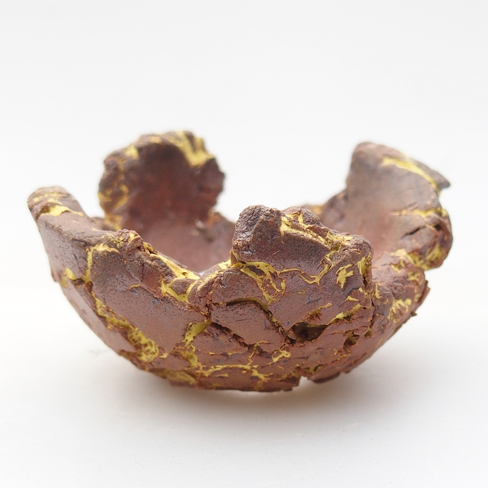 Schelp van keramiek 5,5 x 5 x 4 cm , kleur geel