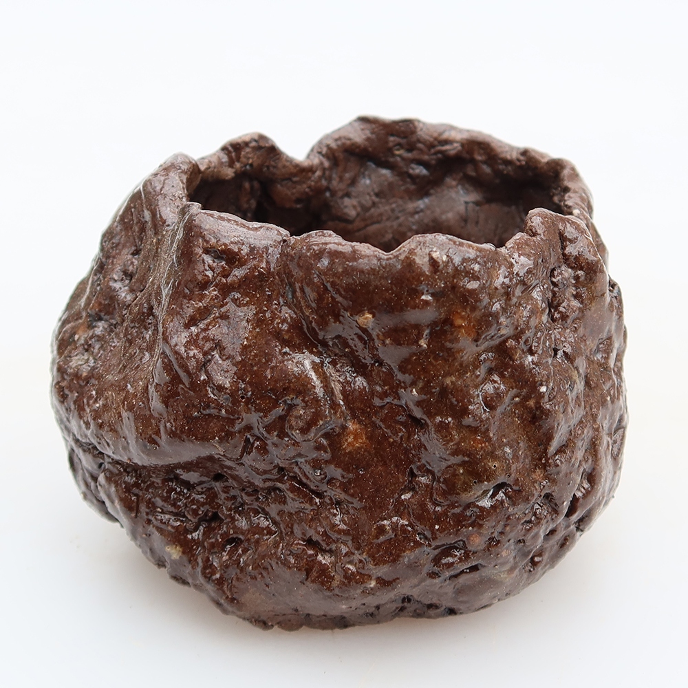 Keramische schaal  5,5 x 5 x 5,5 cm , kleur bruin
