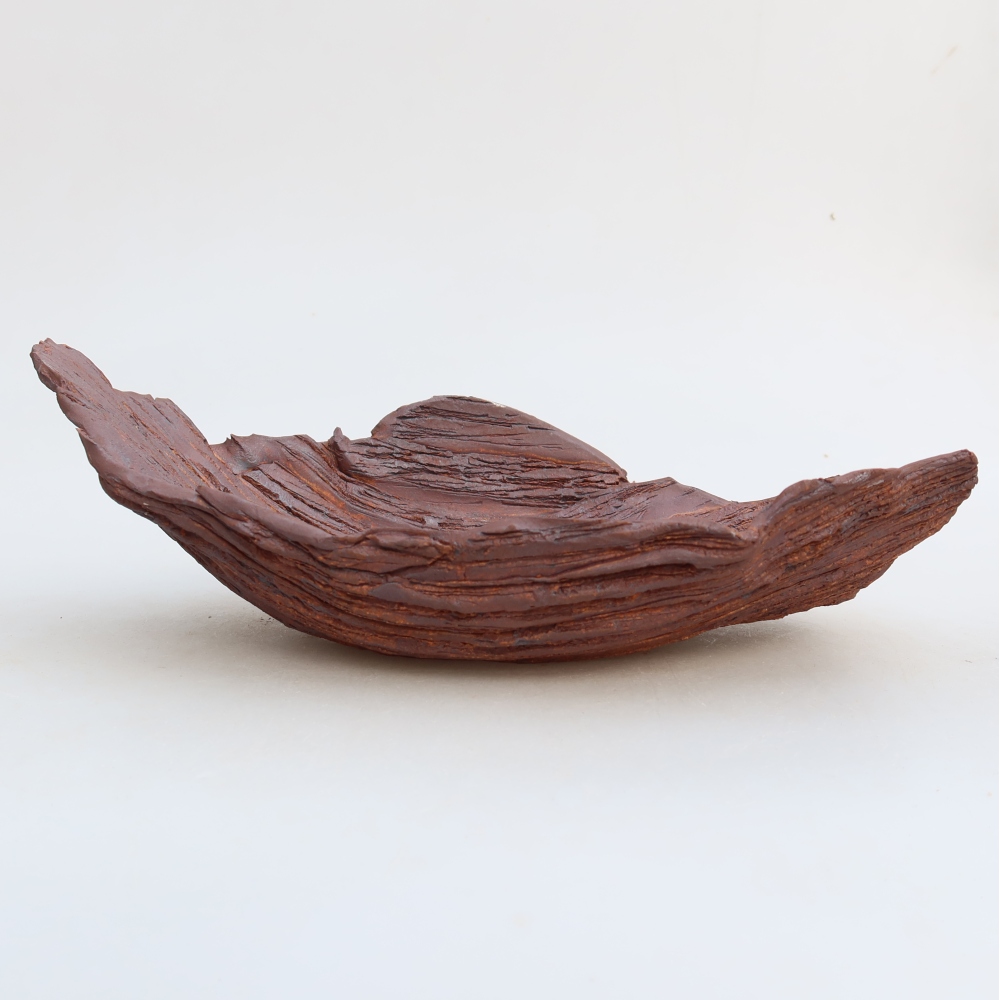 Keramische schaal  24,5 x 14,5 x 7,5 cm, kleur bruin
